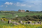 Selinunte the temple hill. Distant view with Temple E in far distance 